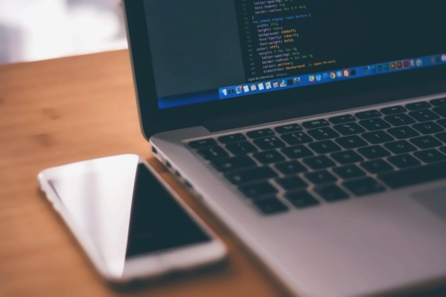 Mobile app development workspace showing active coding session and testing environment